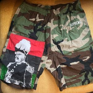 SUPREME camo shorts with Marcus Garvey and liberation flag - size small
